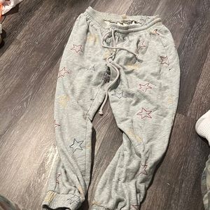Gray sweatpants with stitched colorful stars